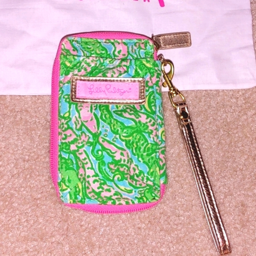 Lilly Pulitzer ID holder wristlet with dust cover.